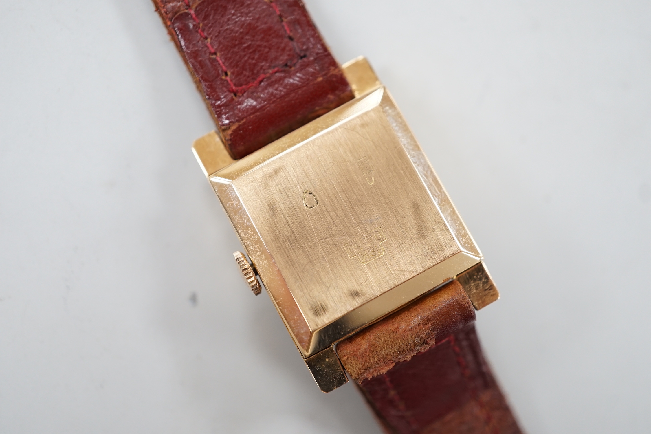 A lady's 18k Pallas manual wind wrist watch, on a leather strap, case diameter 21mm.